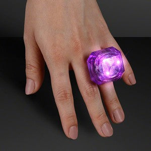 Hand model displaying Purple Lighted Gem Ring