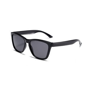 Black framed gray lens