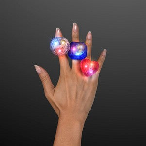 Hand Model showcasing Huge LED Light Up Assorted Blinking Rings