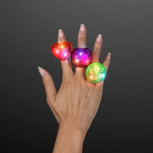 Hand Model showcasing Huge LED Light Up Assorted Blinking Rings